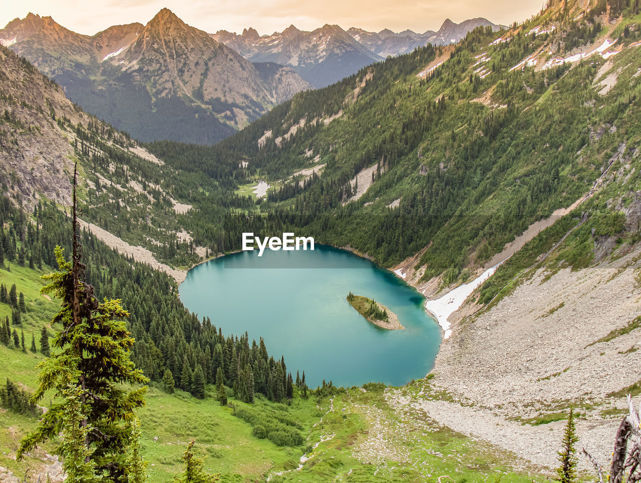 High angle view of lake amidst mountains