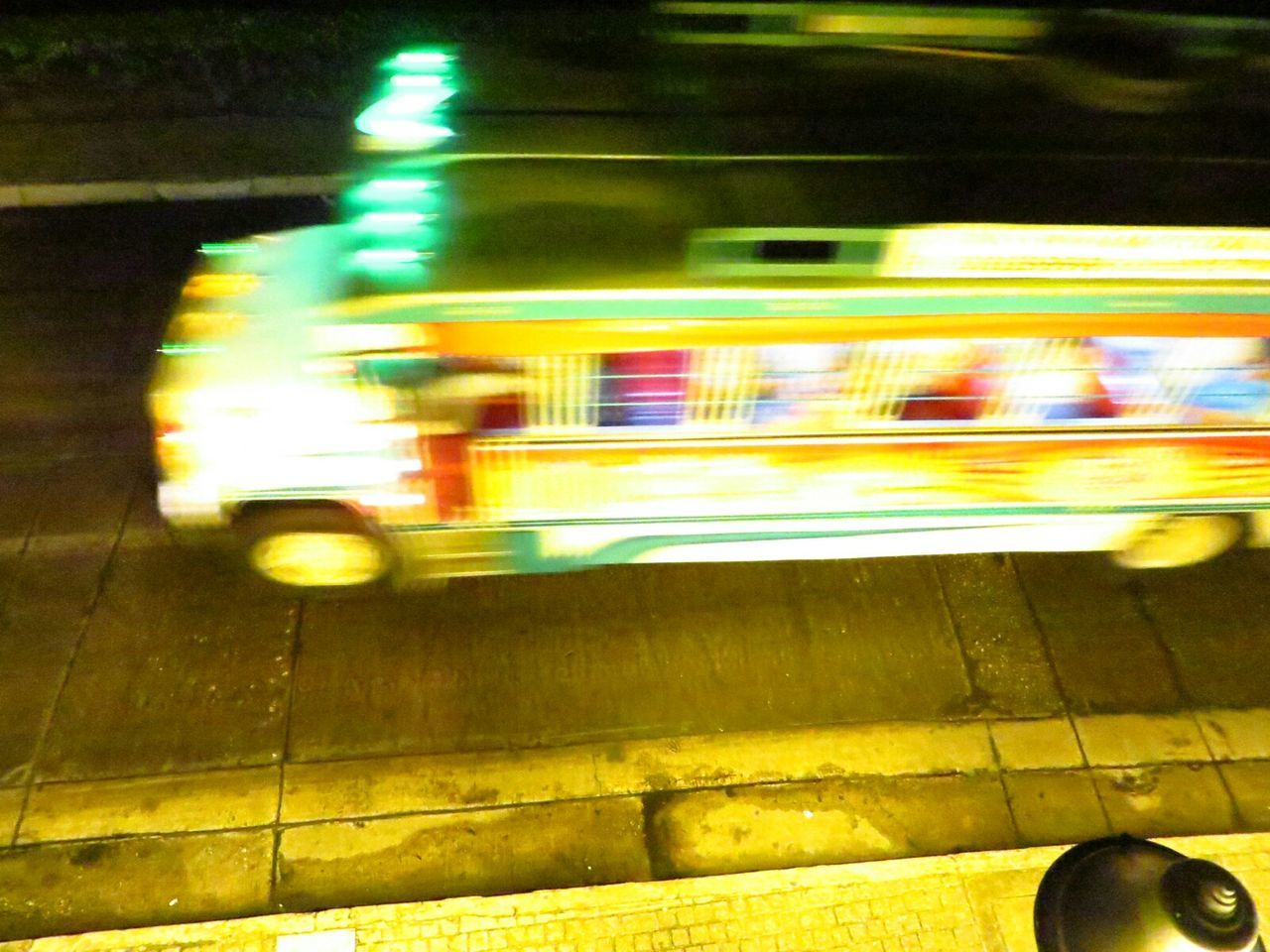 Blurred vehicles on road at night