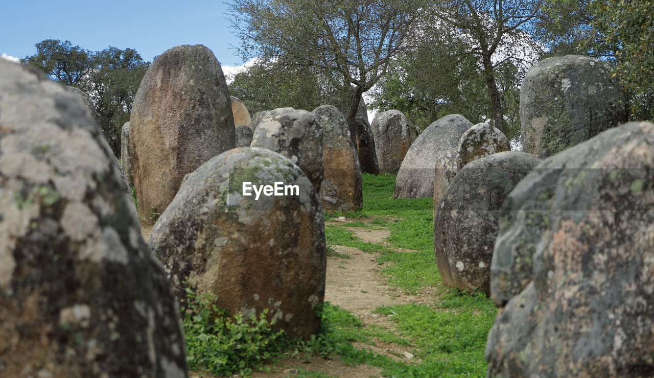 Stones in prehistoric site against the sky