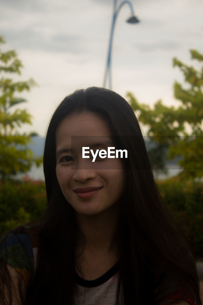 Woman smiling in people's park