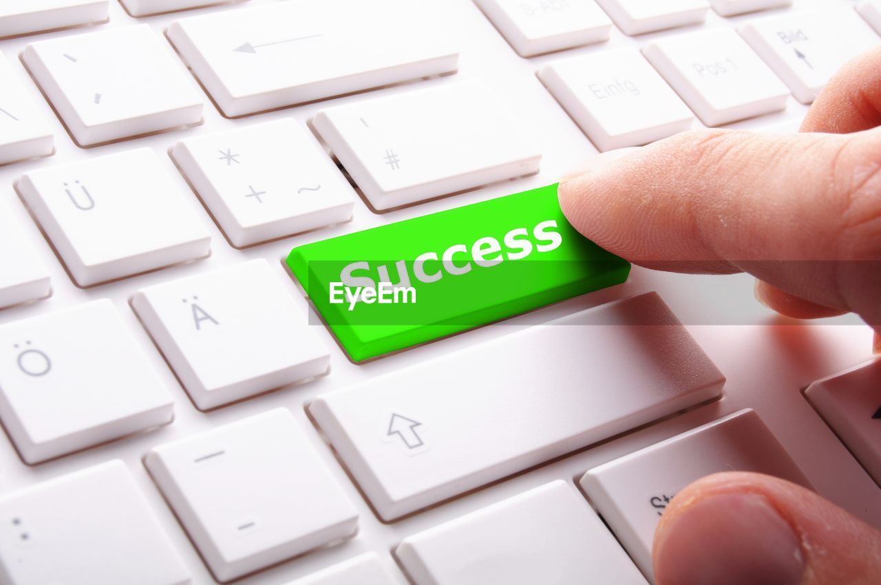 hand, computer, computer keyboard, computer equipment, technology, keyboard, communication, wireless technology, finger, business, computer part, computer key, internet, computer network, using computer, text, font, desktop pc, close-up, one person, adult, typing, laptop, corporate business, indoors, finance