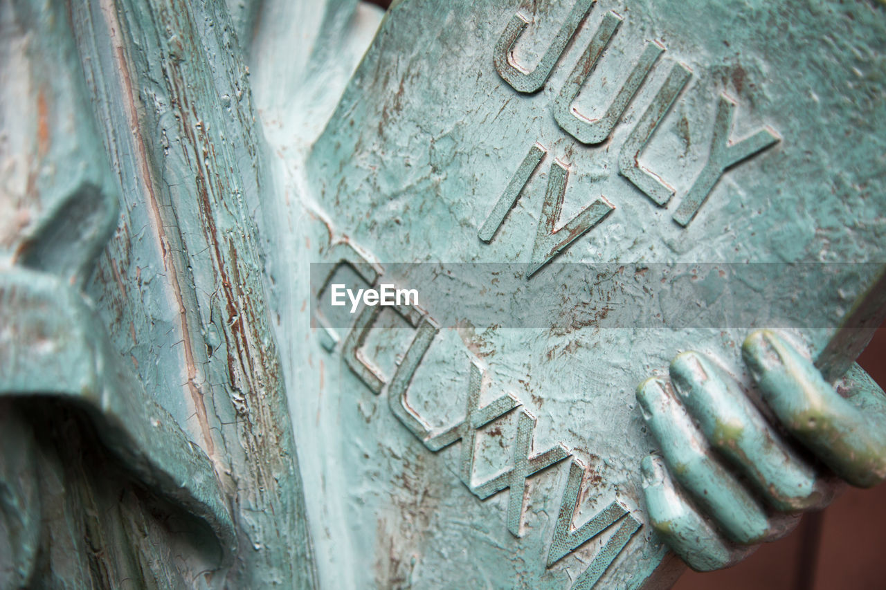 Close-up of text on statue