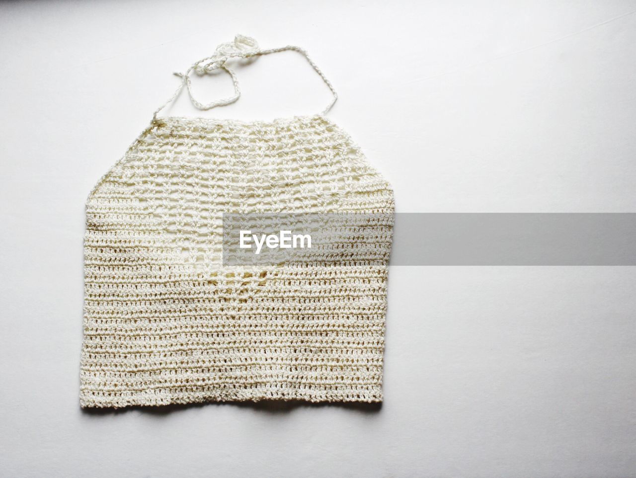 Close-up of clothes hanging on white background