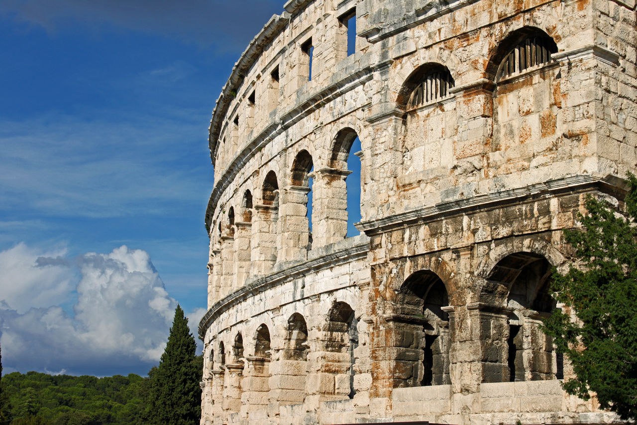 Low angle view of historical building against sky. amphitheater in pula, croatia.