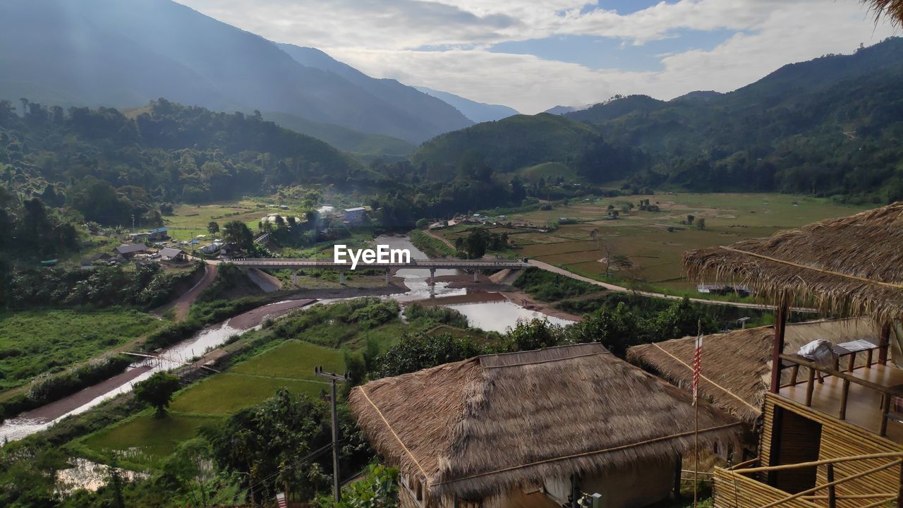 High angle view of agricultural field against mountains