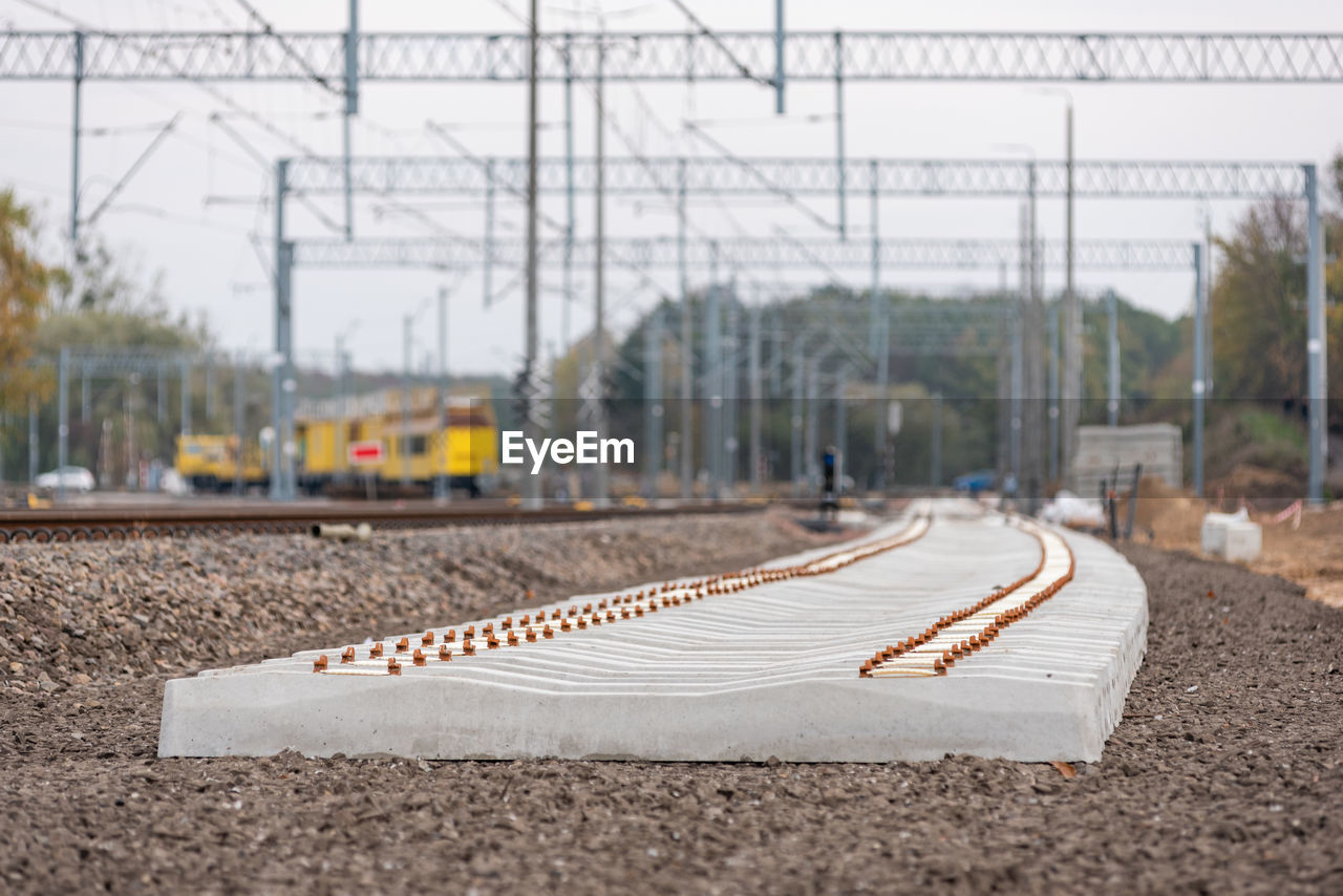 Modernization of the railway line. new track, crushed stone, railway sleepers, poles, trusses.