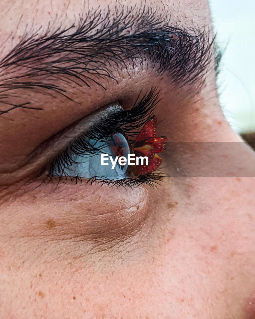 Digital composite image of man eye