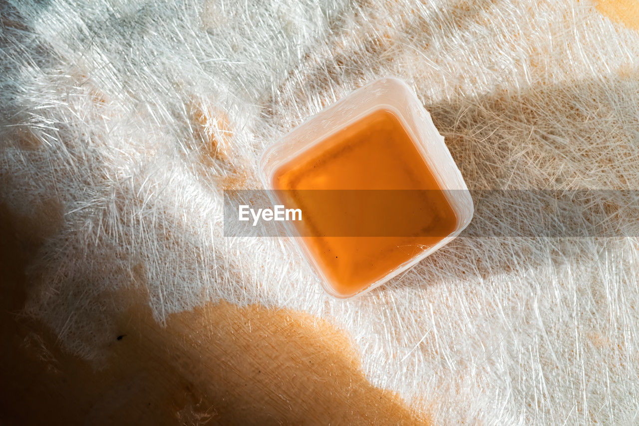 skin, yellow, close-up, no people, indoors, orange color, food and drink, high angle view