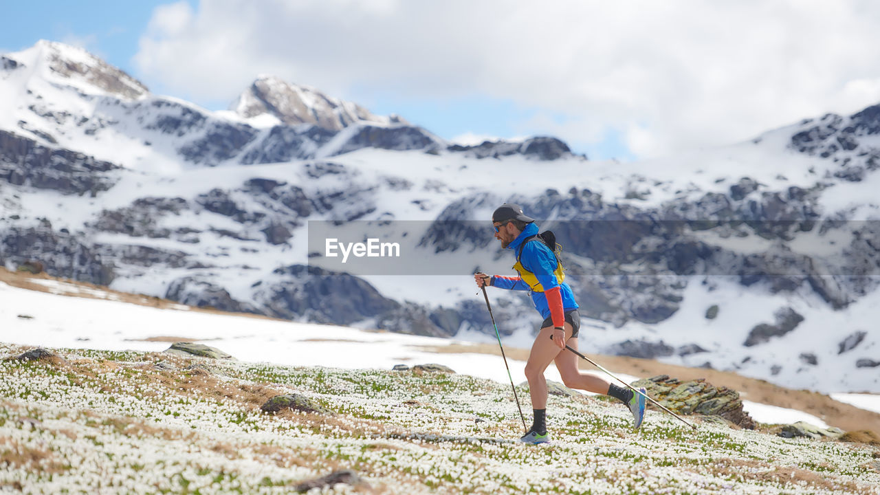 Nordic walking in the mountains in spring