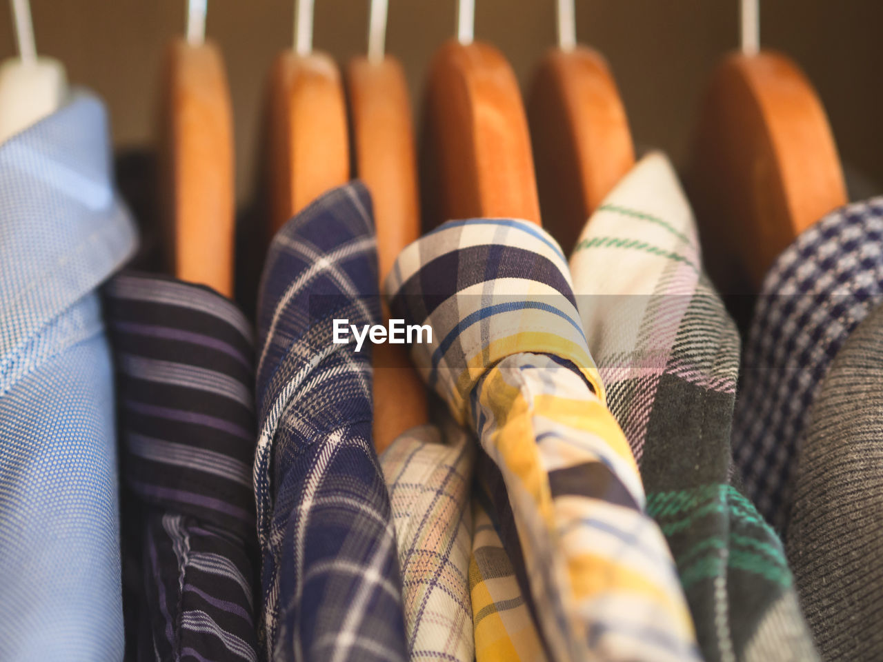 Close-up of clothes hanging on display at store