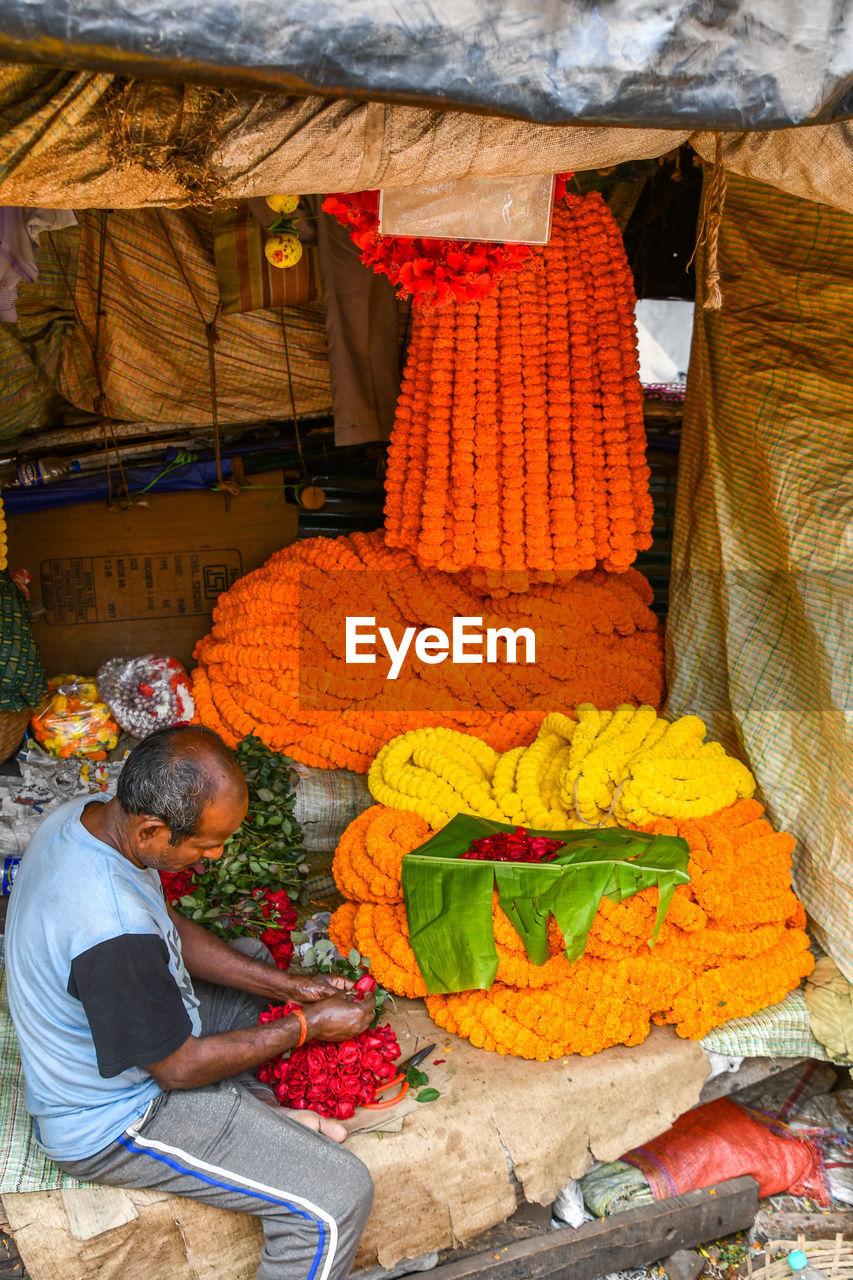 MAN FOR SALE IN MARKET