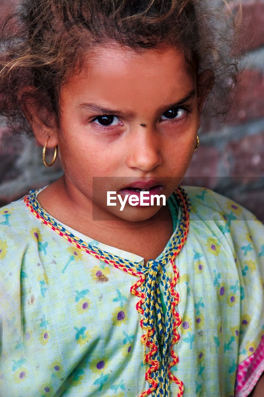 CLOSE-UP PORTRAIT OF CUTE GIRL WITH HAIR