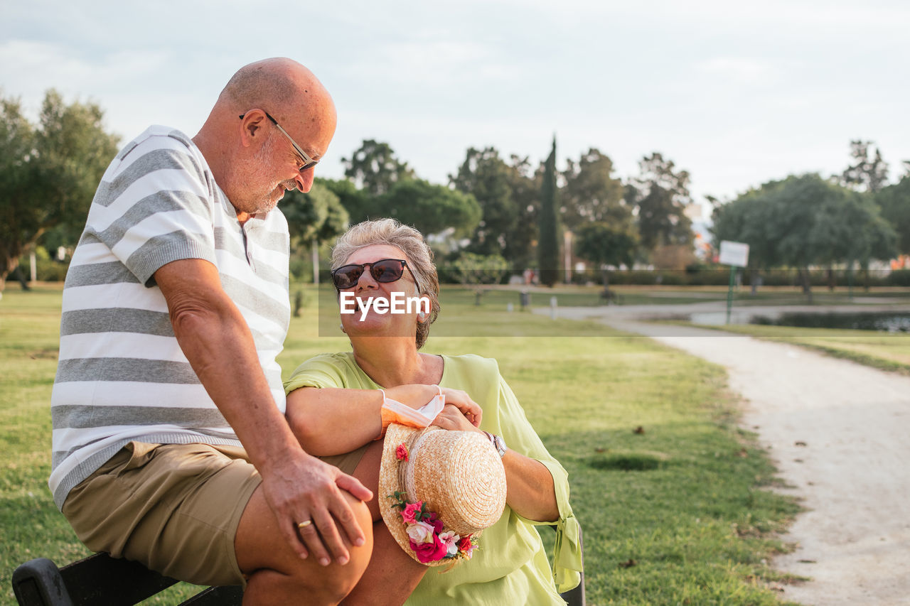 Couple of pensioners looking at each other in love