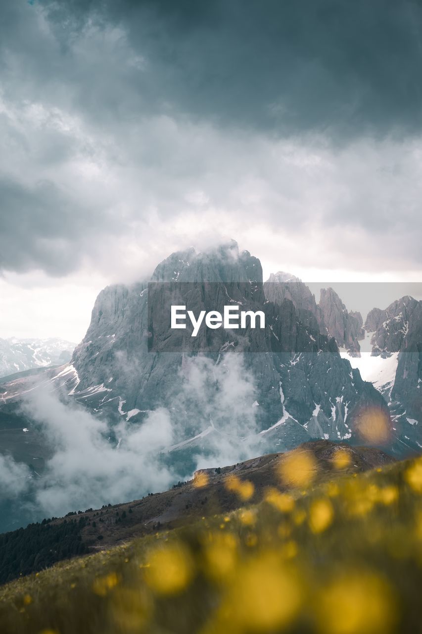 Scenic view of mountains against sky during winter