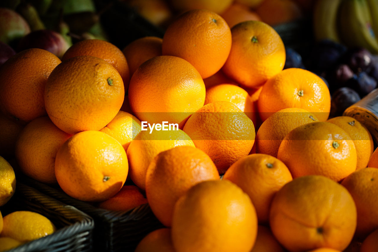 High angle view of oranges for sale at market stall