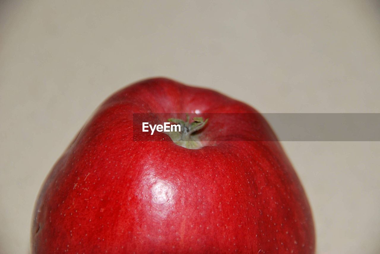 Close-up of apple against white background