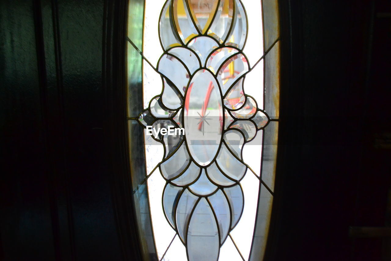 CLOSE-UP OF WINDOW OF TEMPLE