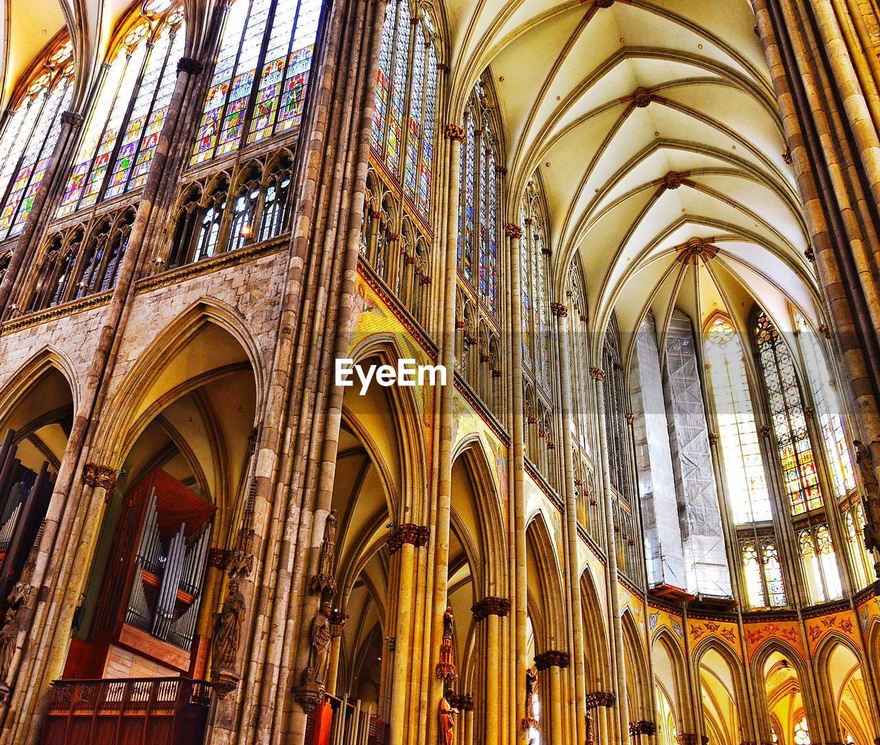 LOW ANGLE VIEW OF CHURCH WITH WINDOWS