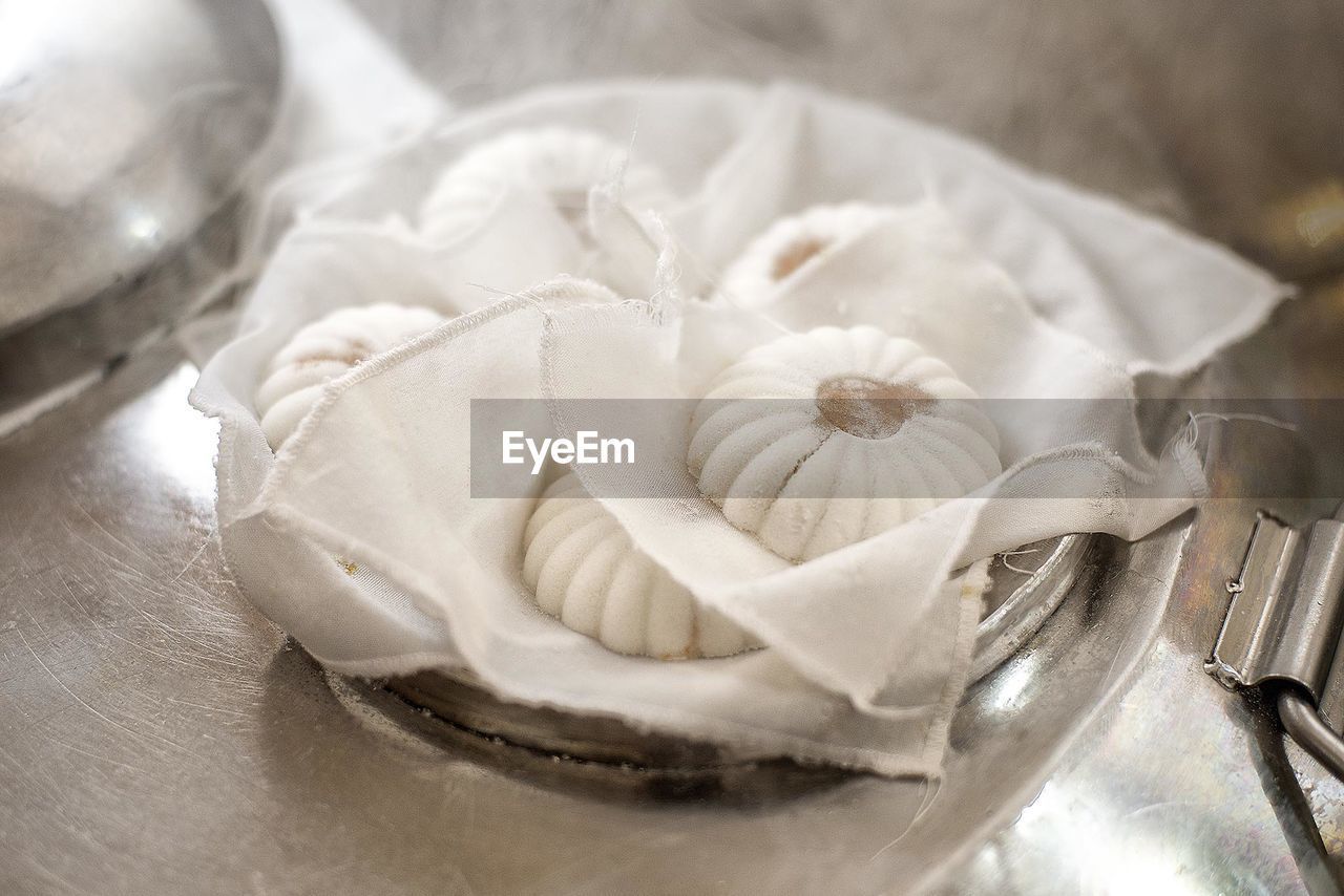 High angle view of steamed cakes preparation