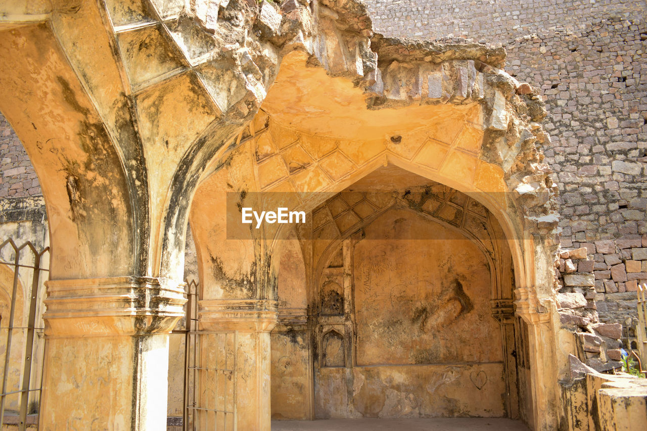 Ancient old historical golconda fort in india background stock photograph.