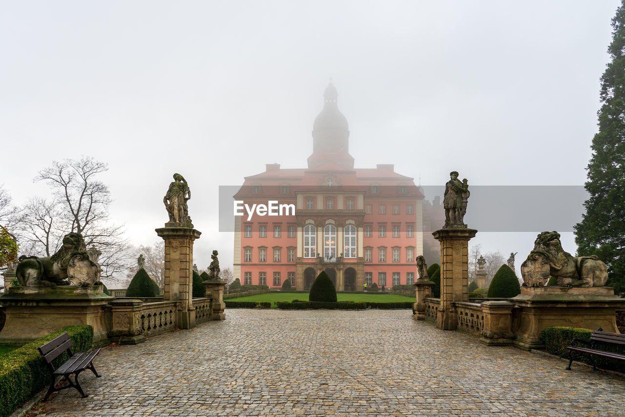 panoramic view of the Książ Castle Castle Famous Place Ancient Travel Destinations Palace Książ Castle Książ Castle Fürstenstein Książ Fürstenstein Fog Morning Tranquil Scene Beautiful Wałbrzych Poland Walbrzych Rococo Baroque Gothic Nobility Majestic Tower History Architecture Built Structure Old Travel Medieval Tree Sky Tourism Past Vacations Europe Wall Outdoors Protection Rock Park