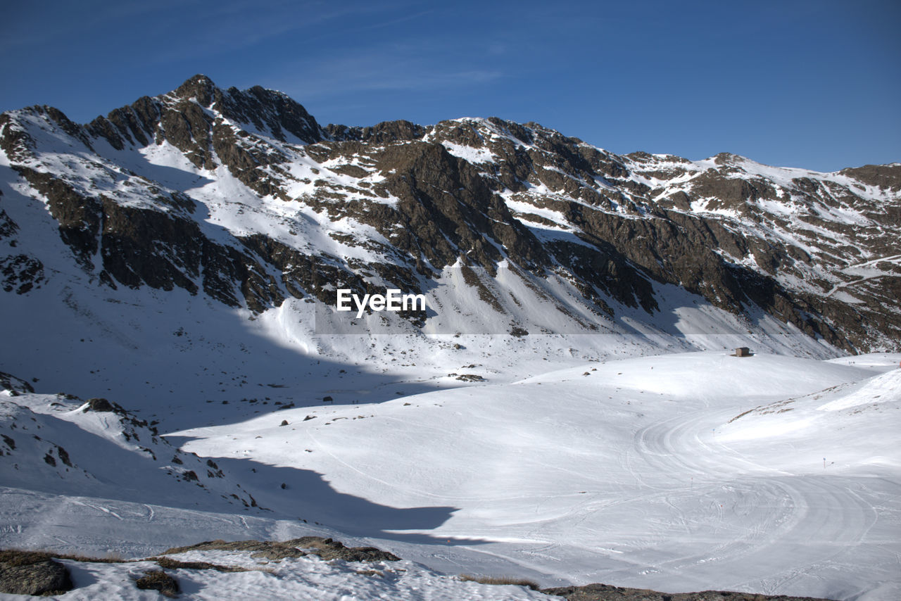 Scenic view of snow covered mountains against sky. ordino-arcalis ski station in andorra.
