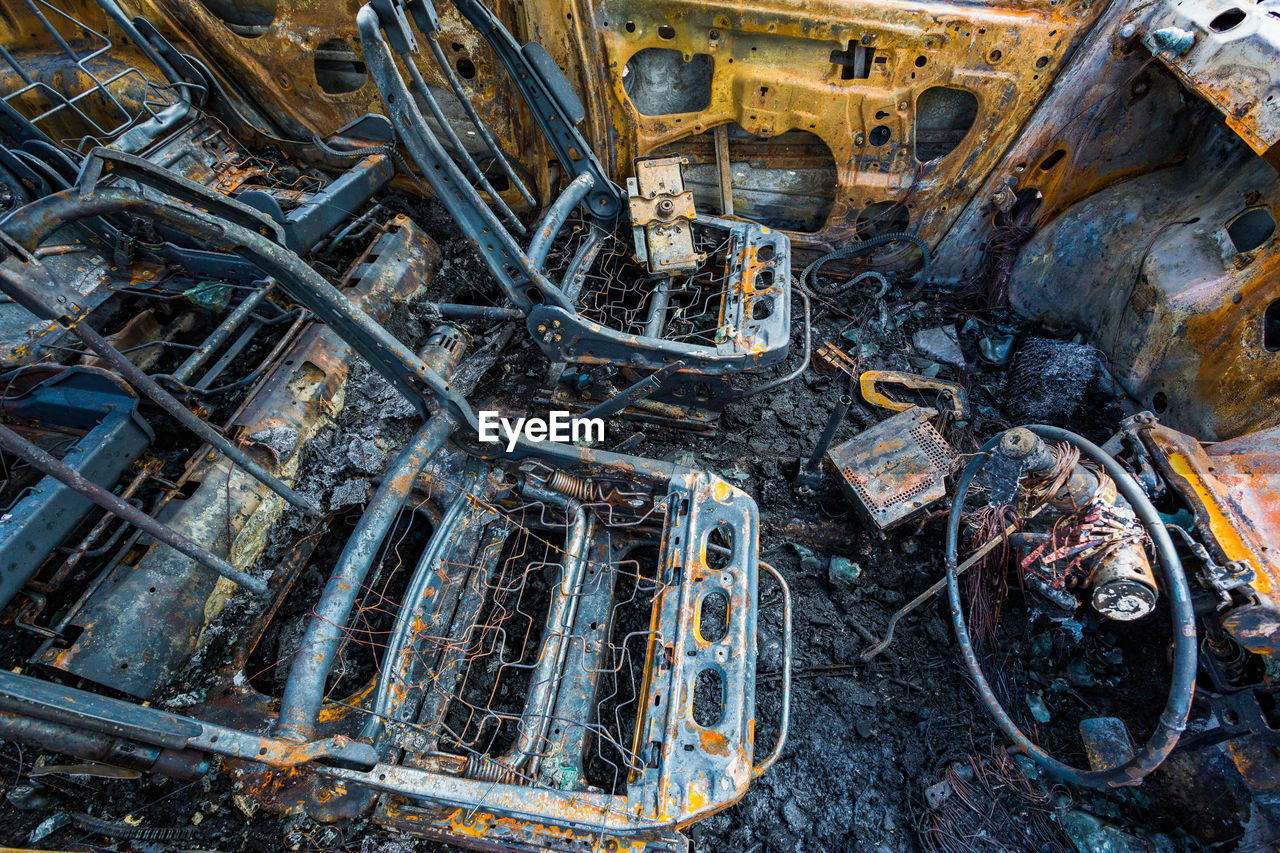 High angle view of burnt vehicle