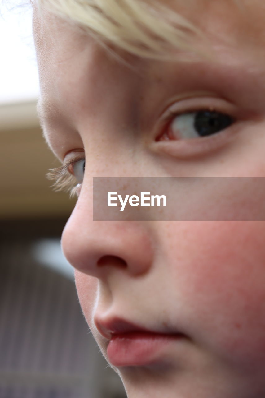 CLOSE-UP PORTRAIT OF GIRL WITH EYES