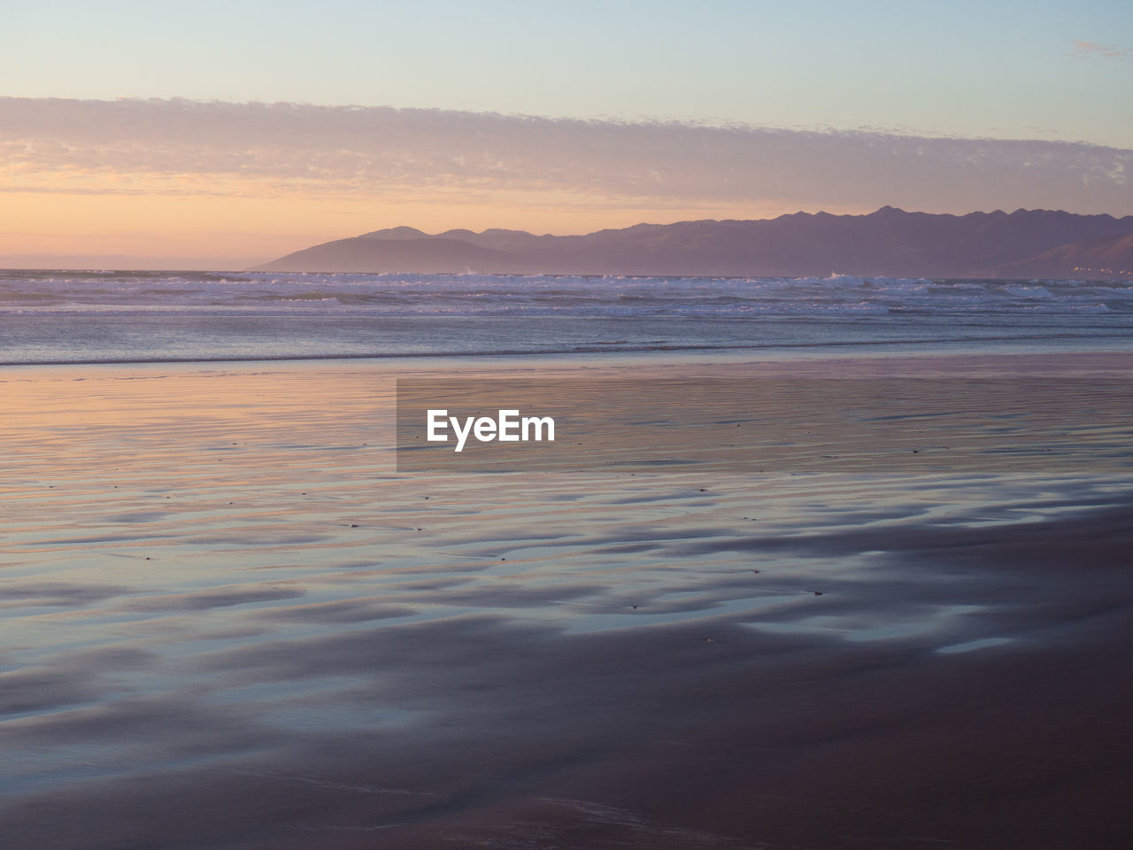 SCENIC VIEW OF SEA DURING SUNSET