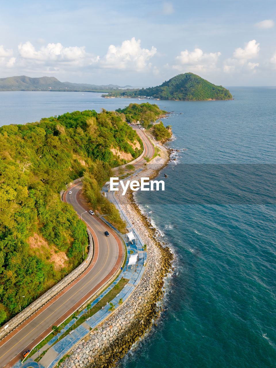 high angle view of sea and mountains against sky