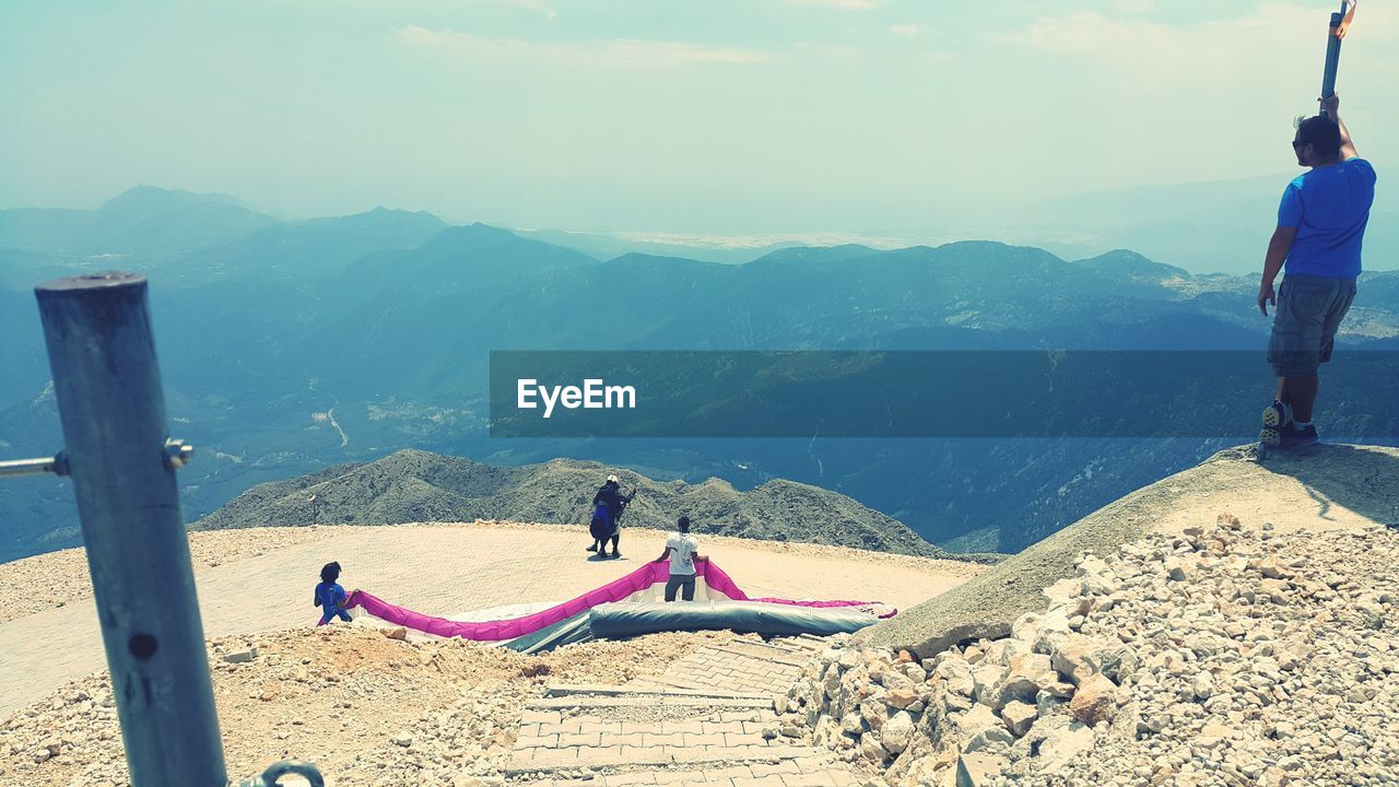 SCENIC VIEW OF MOUNTAINS AND SEA