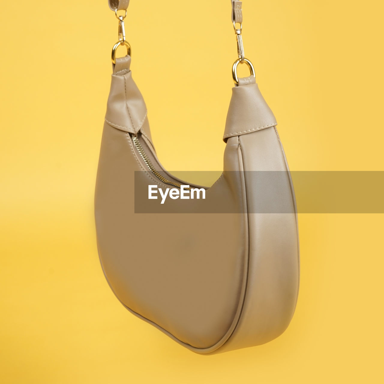 yellow, studio shot, hanging, colored background, no people, indoors, yellow background, gold, single object, cut out