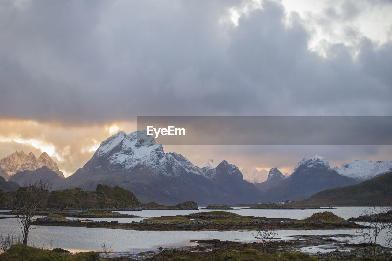 Scenic view of snowcapped mountains against sky in lofoten islands, northern norway