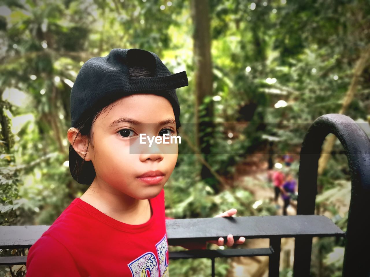 PORTRAIT OF CUTE BOY LOOKING AWAY