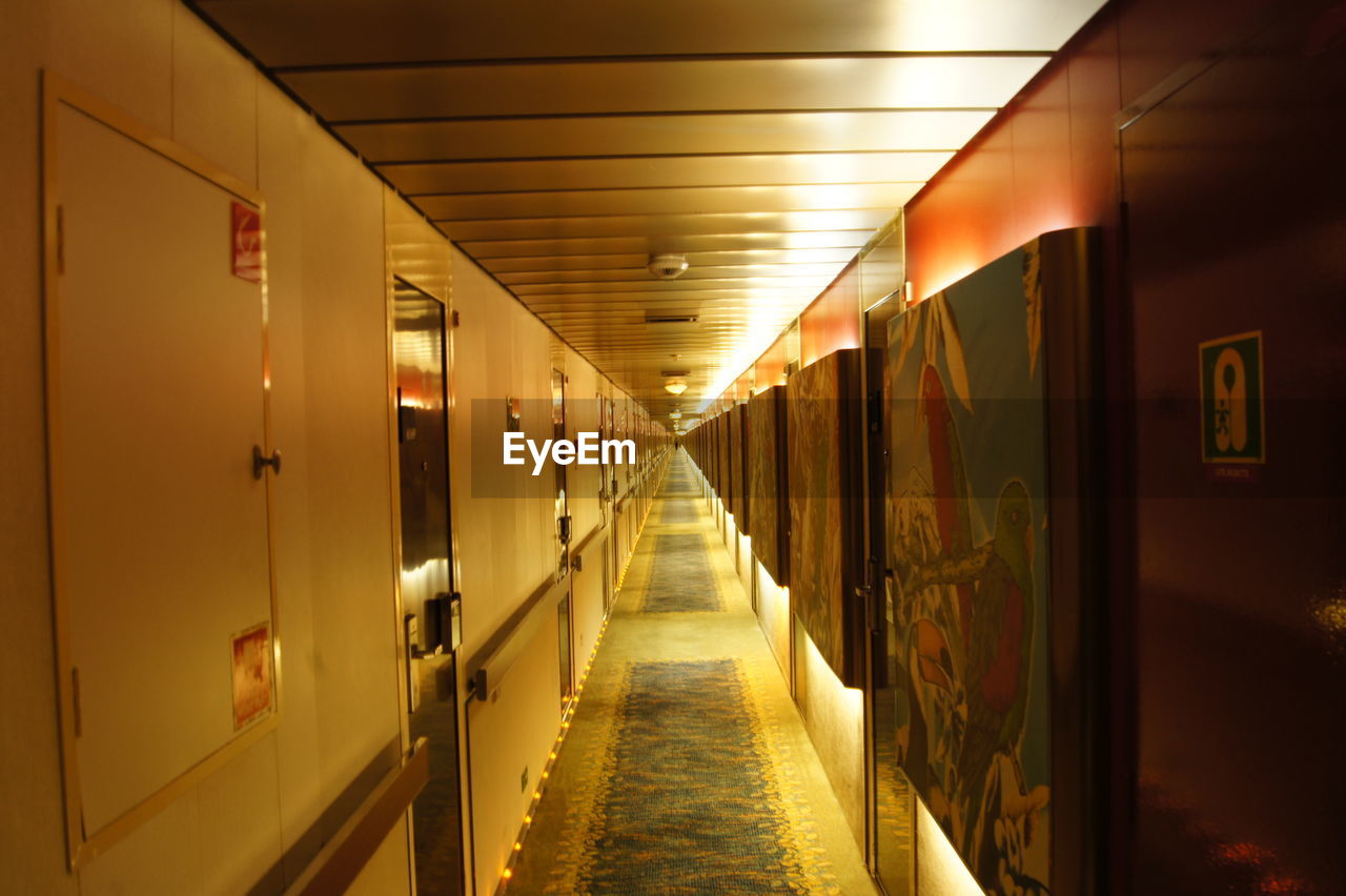 ILLUMINATED CORRIDOR IN BUILDING