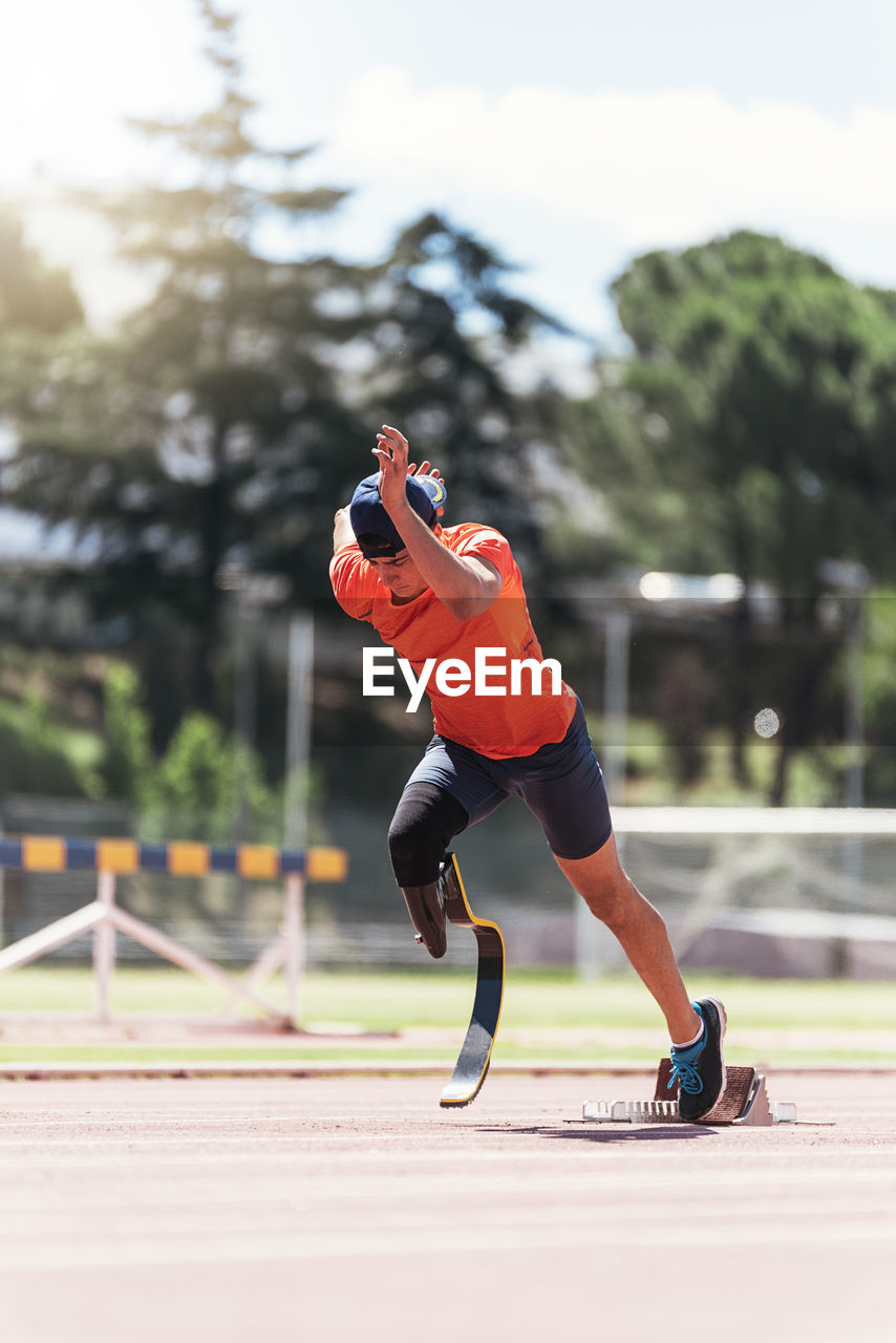 Man with prostethic leg running