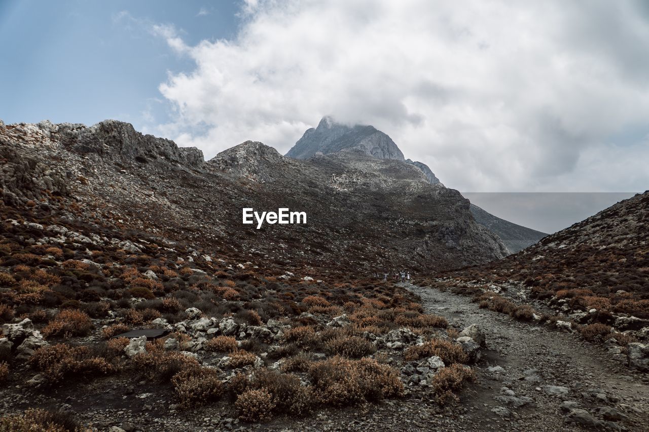 Scenic view of rocky mountains against sky