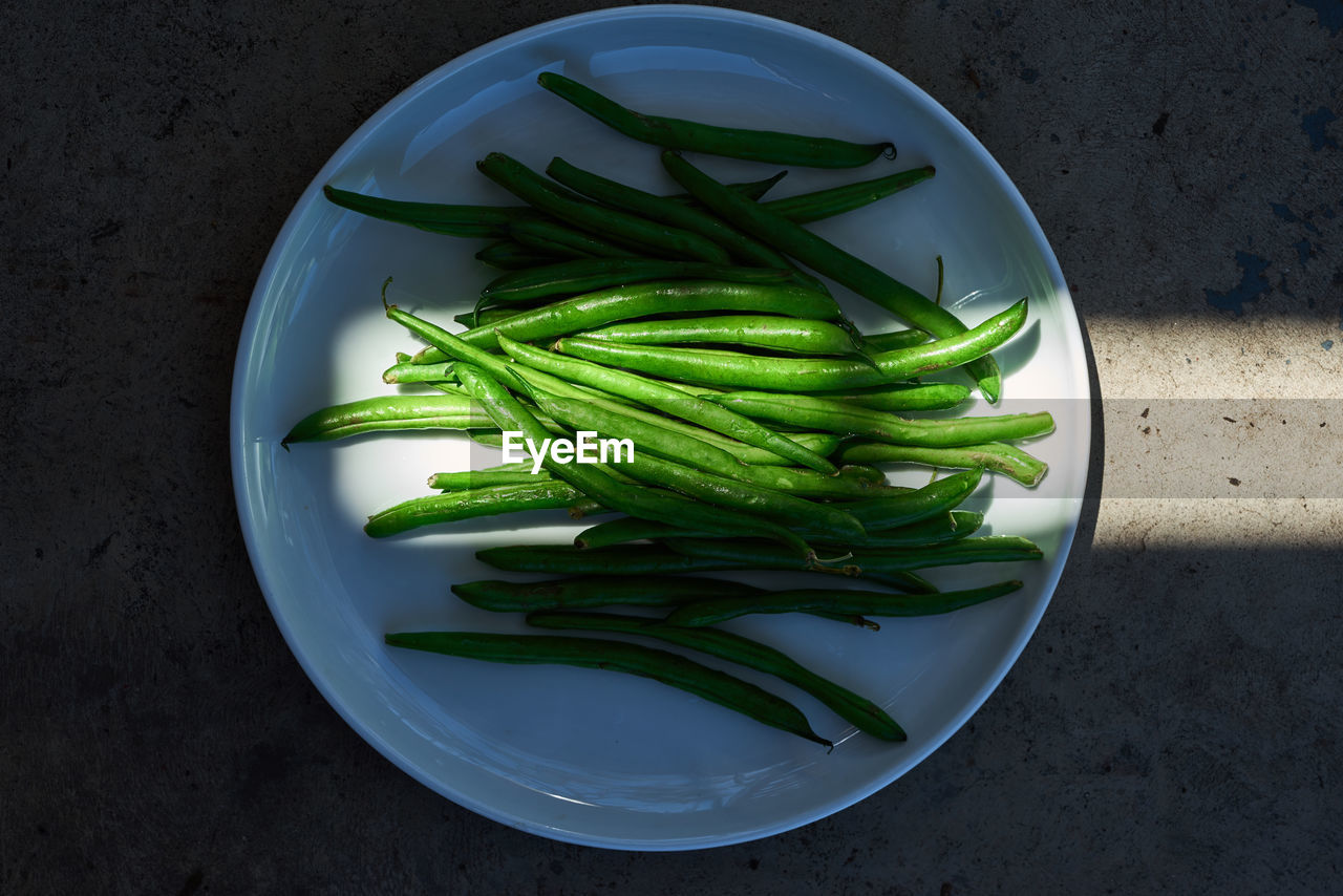 High angle view of green beans on table