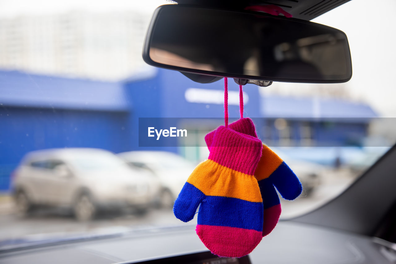 Close-up of umbrella in car