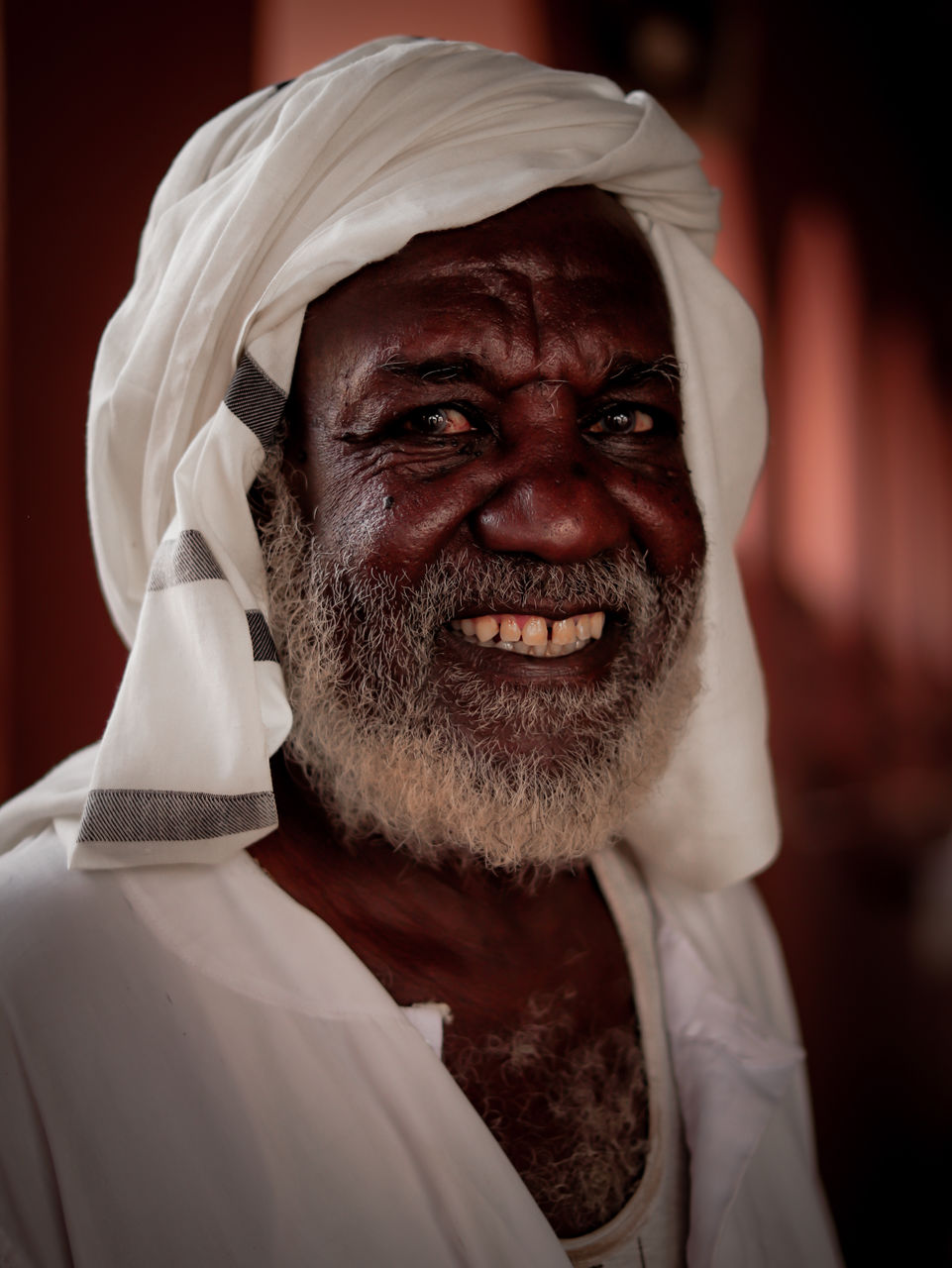 Portrait of old sudanese man smiling 