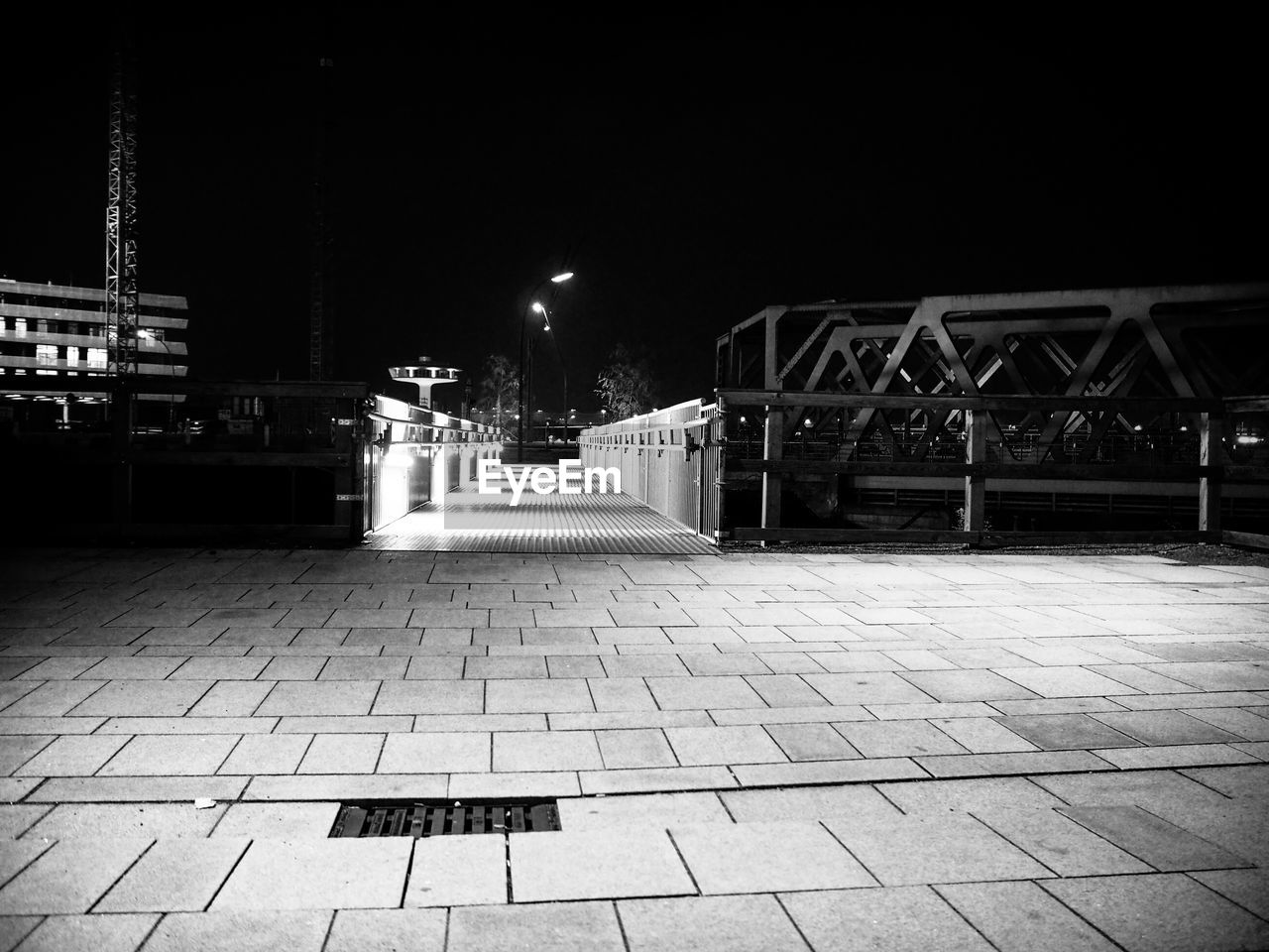 ILLUMINATED STREET LIGHTS AT NIGHT