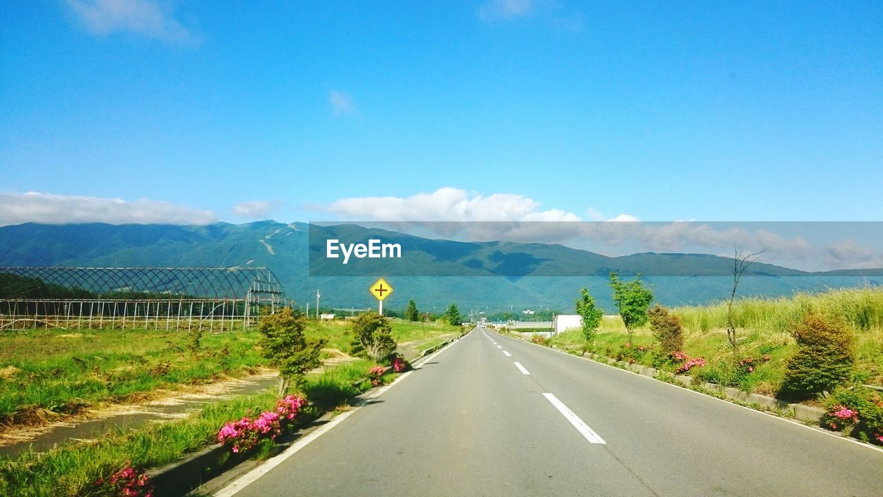 Surface level of road along countryside landscape