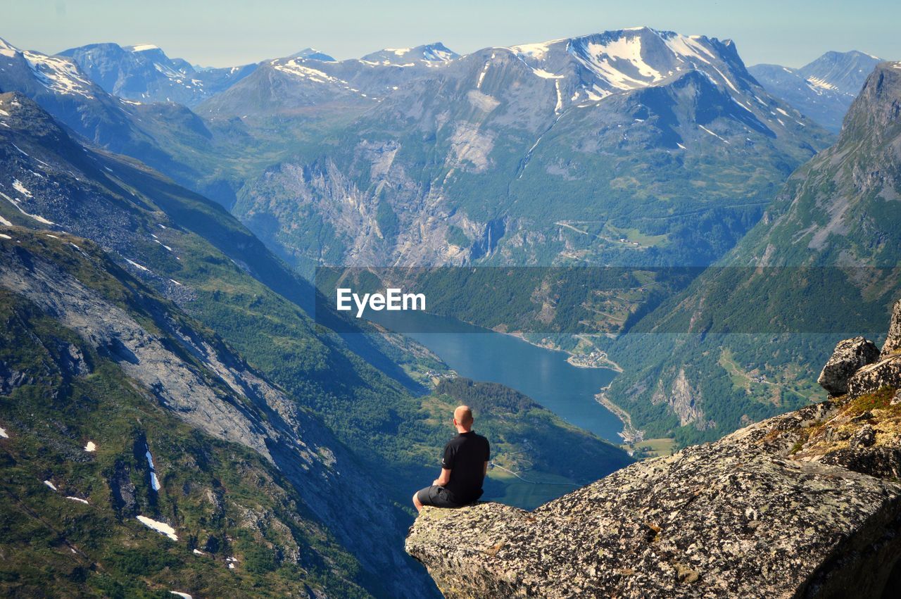 Man looking at mountains