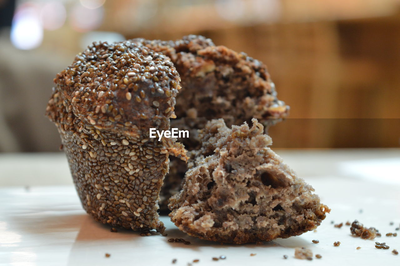 Close-up of nut cake with sesame seeds on table