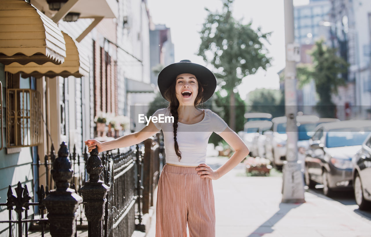 Woman standing in city