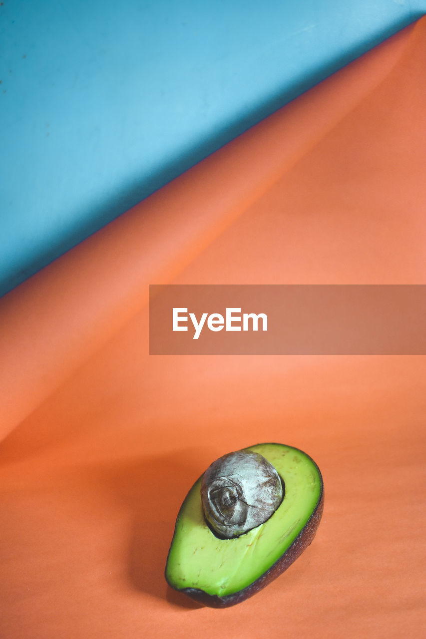 Close-up of fruit on colorful table