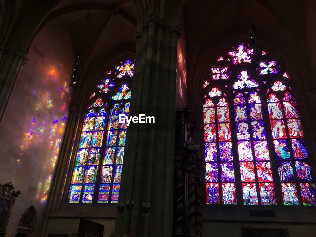 LOW ANGLE VIEW OF STAINED GLASS WINDOW IN TEMPLE