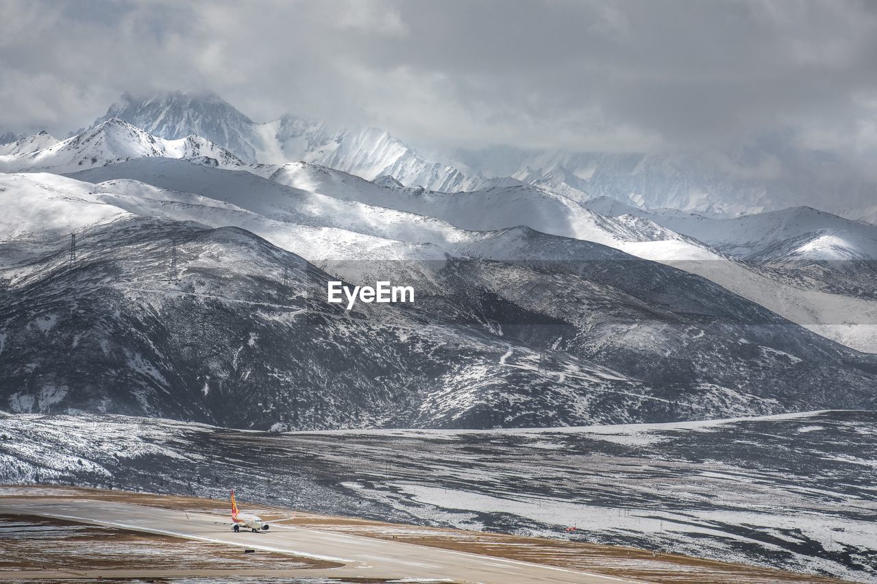 Scenic view of snowcapped mountains 