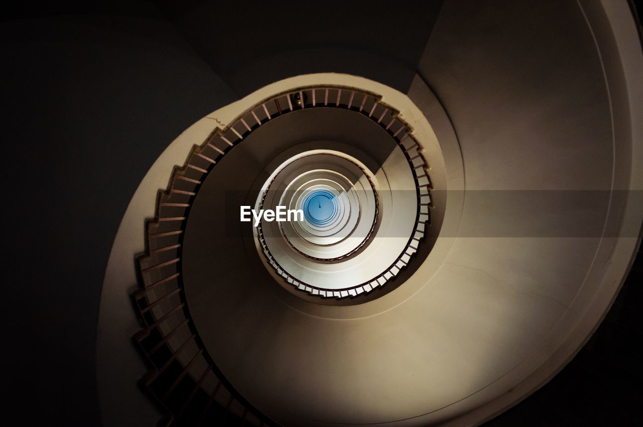 Directly below shot of spiral staircases