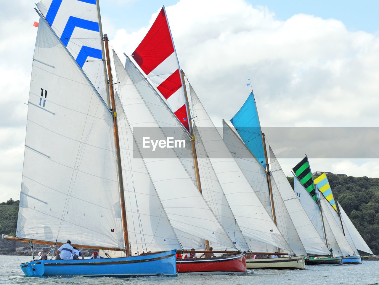 LOW ANGLE VIEW OF BOATS ON BEACH